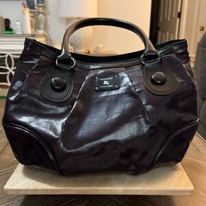 Burberry Blue Label purple coated canvas shoulder bag.